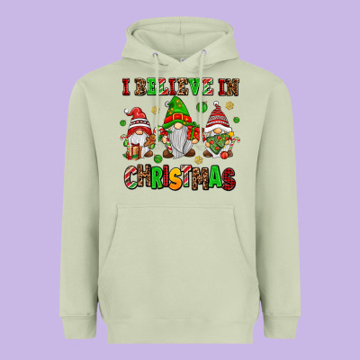I Believe In Christmas Heavyweight Hoodie Designed By Adodesignshop