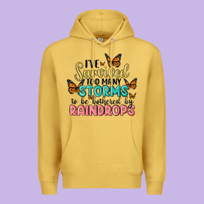 I Have Survived Too Many Storms To Be Bothered By Raindrops Malia Premium Hoodie Designed By Maliassmallbusiness