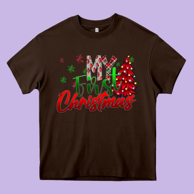 My First Christmas Heavy Core Tee Designed By Cowhidedigitalart