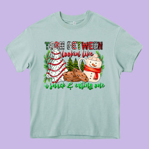 Torn Between Looking Like A Snack Eating One Heavy Core Tee Designed By Cowhidedigitalart