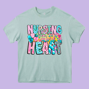 Nursing Is A Work Of Heart Heavy Core Tee Designed By Cowhidedigitalart