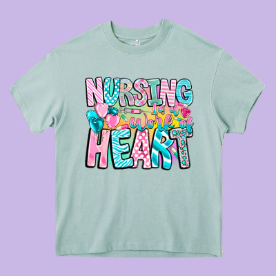 Nursing Is A Work Of Heart Heavy Core Tee Designed By Cowhidedigitalart