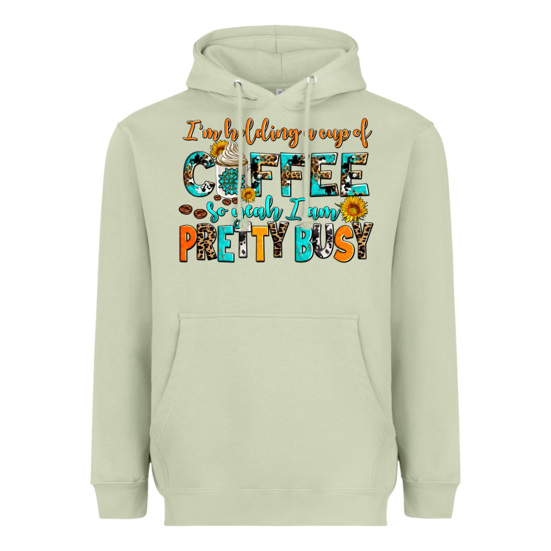 I Am Holding A Cup Of Coffee So Yeah Iam Pretty Bu Heavyweight Hoodie by AdoDesignShop | Teevron