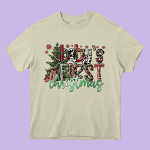 Baby's First Christmas Heavy Core Tee Designed By Cowhidedigitalart