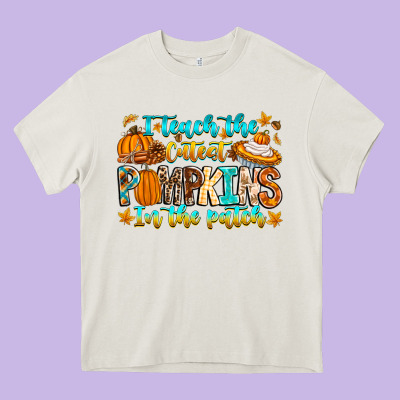 I Teach The Cutest Pumpkins In The Patch Heavy Core Tee Designed By Cowhidedigitalart
