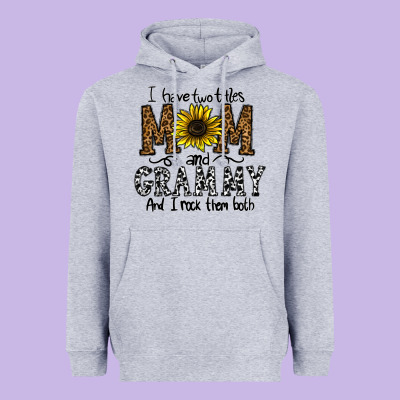 I Have Two Titles Mom And Grmmh And I Rock Them Both Heavyweight Hoodie Designed By Cowhidedigitalart