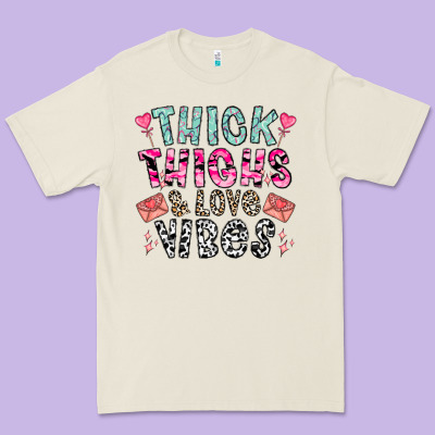 Thick Thighs And Love Vibes Premium Tee Designed By Cowhidedigitalart