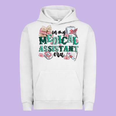 In My Medical Assistant Era Urban Hoodie Designed By Maliassmallbusiness
