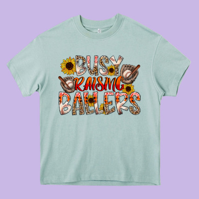 Busy Raising Ballers Heavy Core Tee Designed By Cowhidedigitalart