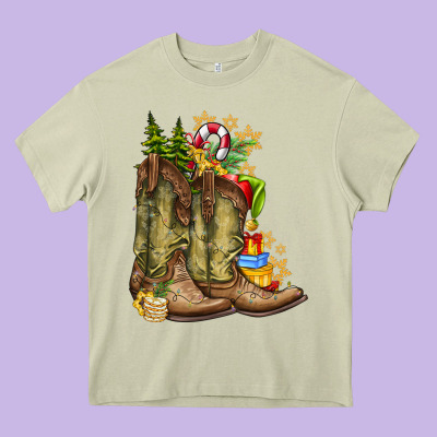 Christmas Boots Heavy Core Tee Designed By Cowhidedigitalart