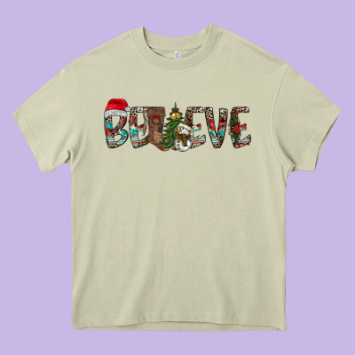 Believe Christmas Heavy Core Tee Designed By Cowhidedigitalart