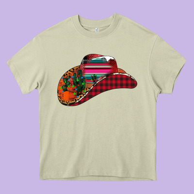 Christmas Cowboy Heavy Core Tee Designed By Cowhidedigitalart