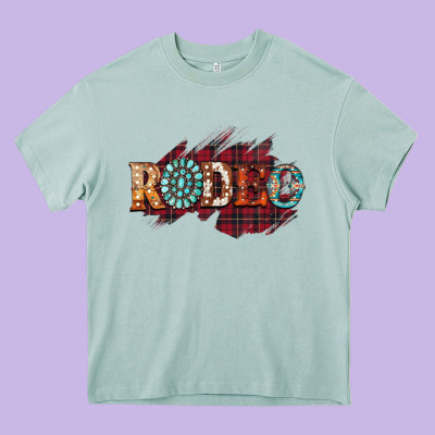 Rodeo Christmas Heavy Core Tee Designed By Cowhidedigitalart