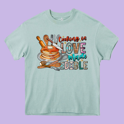 Cooking Is Love Made Edible Heavy Core Tee Designed By Cowhidedigitalart