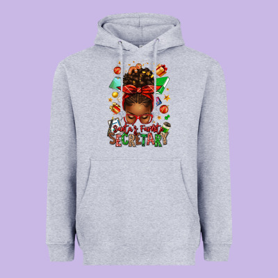 Santa's Favorite Secretary Afro Messy Bun Heavyweight Hoodie Designed By Texasbilliewilder