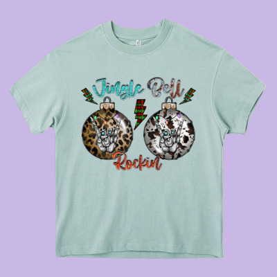 Jingle Bell Rockin Heavy Core Tee Designed By Cowhidedigitalart