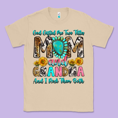 God Gifted Me Two Titles Mom And Grandma And I Roc Classic Tee Designed By Ranaportraitstore