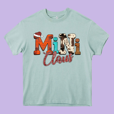 Mini Claus Heavy Core Tee Designed By Cowhidedigitalart