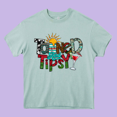 Tanned And Tipsy Heavy Core Tee Designed By Cowhidedigitalart