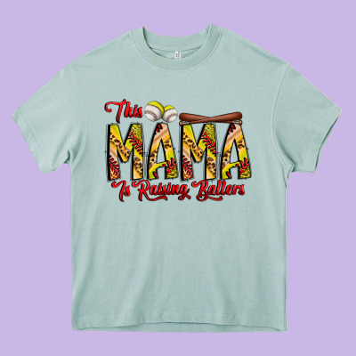 This Mama Is Raising Ballers Softball And Baseball Heavy Core Tee Designed By Cowhidedigitalart