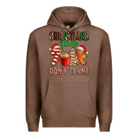 Chestnut christmas calories dont count with  christmas tree cake and cookies ad Premium Hoodie - AdoDesignShop