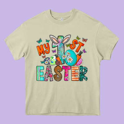 My 1st Easter Heavy Core Tee Designed By Cowhidedigitalart