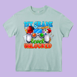 1st Grade Level Unlocked Heavy Core Tee Designed By Cowhidedigitalart