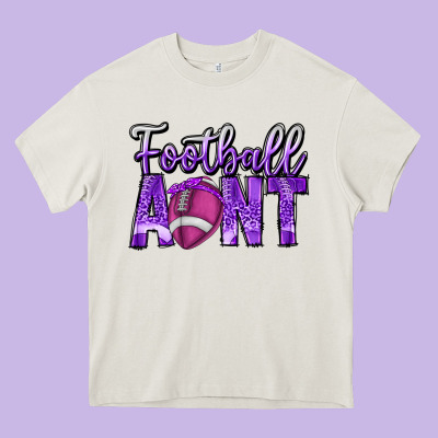 Football Aunt Heavy Core Tee Designed By Cowhidedigitalart