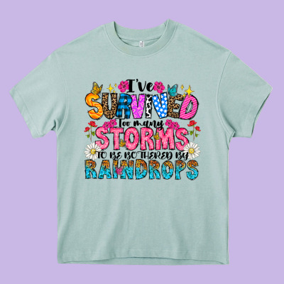 Ive Survived Too Many Storms To Be Thered By Raind Heavy Core Tee Designed By Cowhidedigitalart
