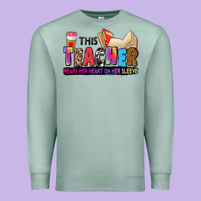 This Teacher Wears Her Heart On Her Sleeve Premium Sweatshirt Designed By Zillion Design Studio