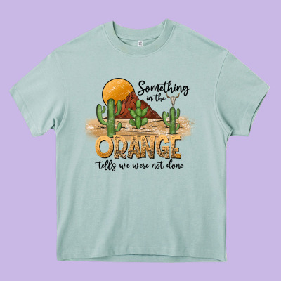 Something In The Orange Tells We Were Not Done Heavy Core Tee Designed By Cowhidedigitalart