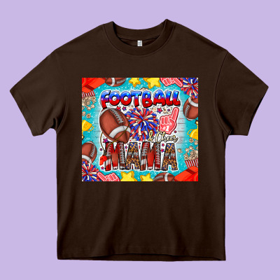 Football Mama Heavy Core Tee Designed By Cowhidedigitalart