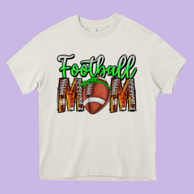 Football Mom Heavy Core Tee Designed By Cowhidedigitalart