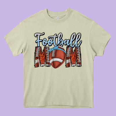 Football Mom Heavy Core Tee Designed By Cowhidedigitalart