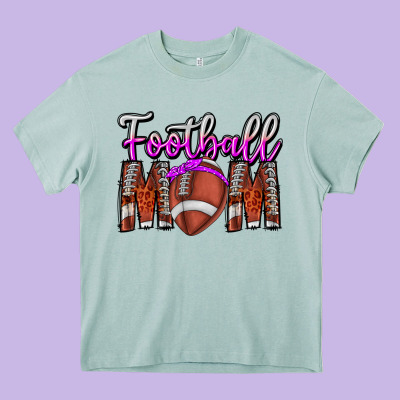 Football Mom Heavy Core Tee Designed By Cowhidedigitalart