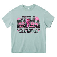 Arona Just a Mama Out Here Trying Not To Raise Assholes Heavy Core Tee - CowhideDigitalArt