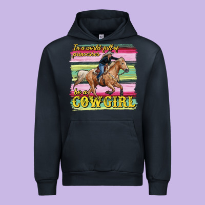 In A World Full Of Princesses Be A Cowgirl Urban Hoodie Designed By Ranaportraitstore