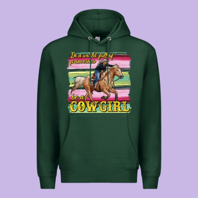 In A World Full Of Princesses Be A Cowgirl Premium Hoodie Designed By Ranaportraitstore