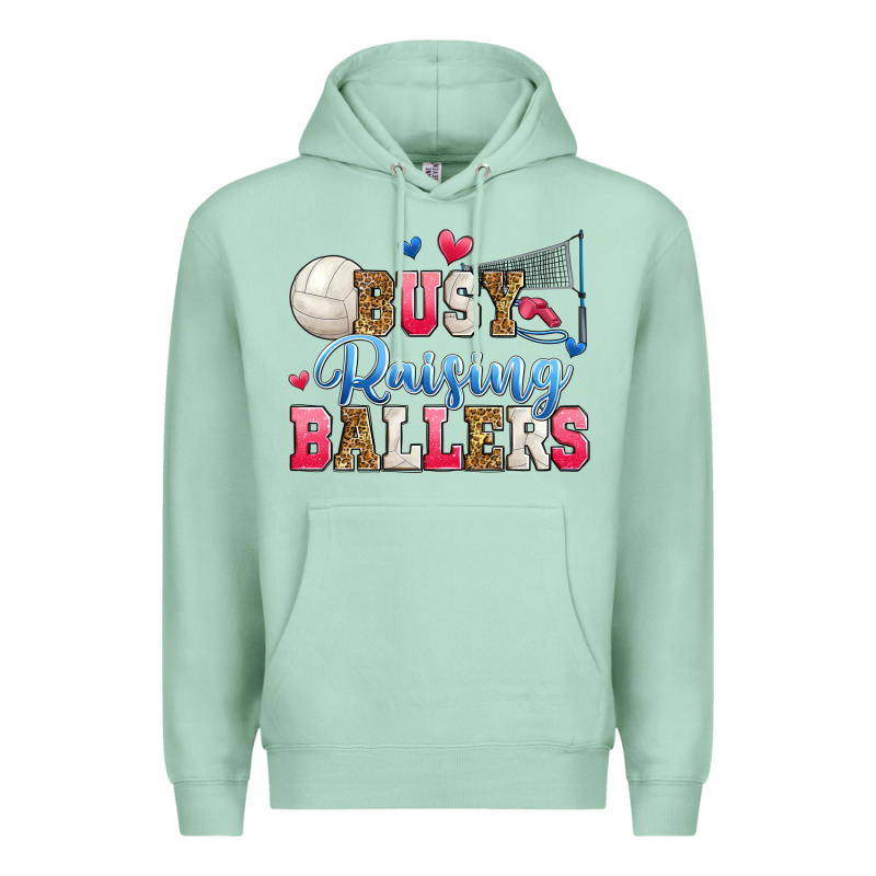 Busy Raising Ballers Volleyball Premium Hoodie by Zillion Design Studio | Teevron