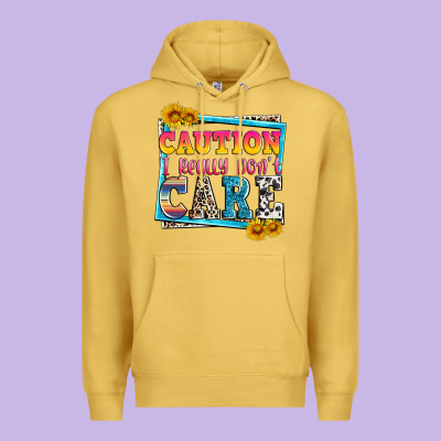 Caution I Really Don't Care Premium Hoodie Designed By Zillion Design Studio
