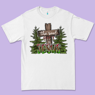 The Real Gift Is Jesus Premium Tee Designed By Cowhidedigitalart