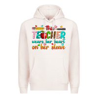 Pale Pink this teacher wears her heart on her sleeve Premium Hoodie - texasbilliewilder
