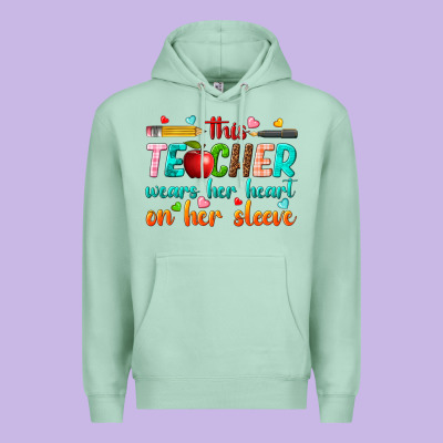 This Teacher Wears Her Heart On Her Sleeve Premium Hoodie Designed By Texasbilliewilder