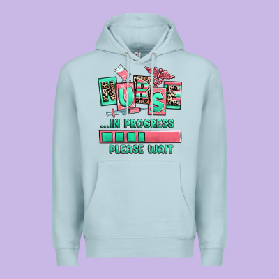 Nurse In Progress Please Wait Premium Hoodie Designed By Ranaportraitstore