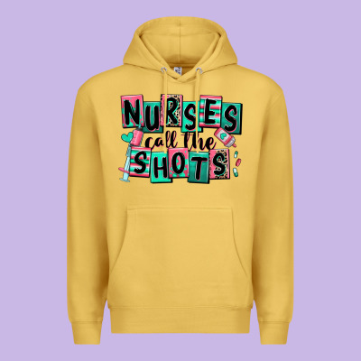 Nurses Call The Shots Premium Hoodie Designed By Ranaportraitstore