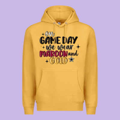 Premium Hoodie on game day we wear maroon and gold
