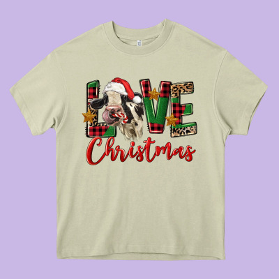 Love Christmas Holstein Heifer Heavy Core Tee Designed By Fadigitalartstudio
