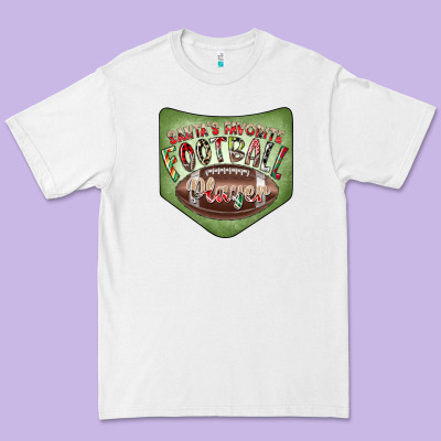 Christmas Pocket Premium Tee Designed By Cowhidedigitalart