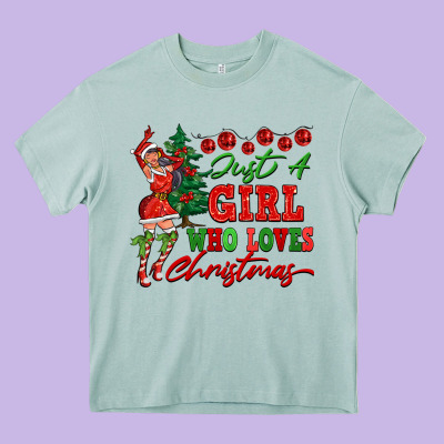 Just A Girl Who Loves Christmas Heavy Core Tee Designed By Fadigitalartstudio