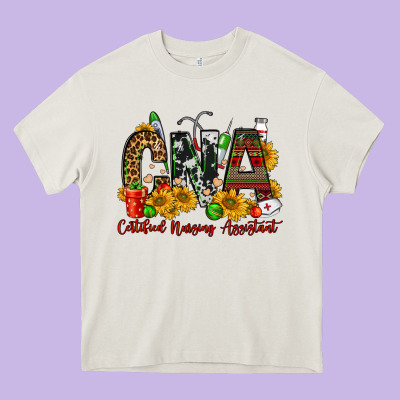 Christmas Cna Certified Nursing Assistant Heavy Core Tee Designed By Fadigitalartstudio